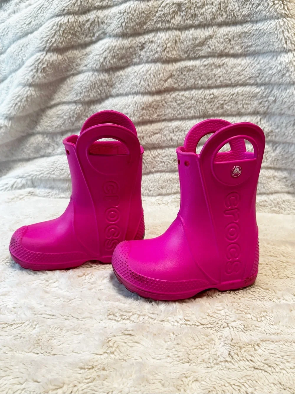 CROCS Kids Waterproof Pull-On Rain Boot in Bright Candy Pink